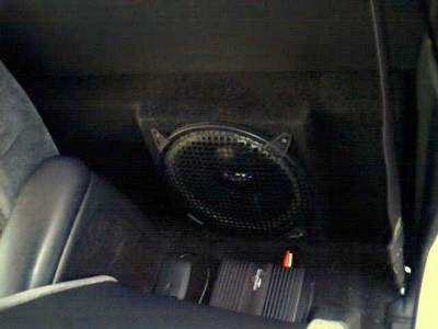 Amp and sub crammed into a standard cab (no leg room lost!)